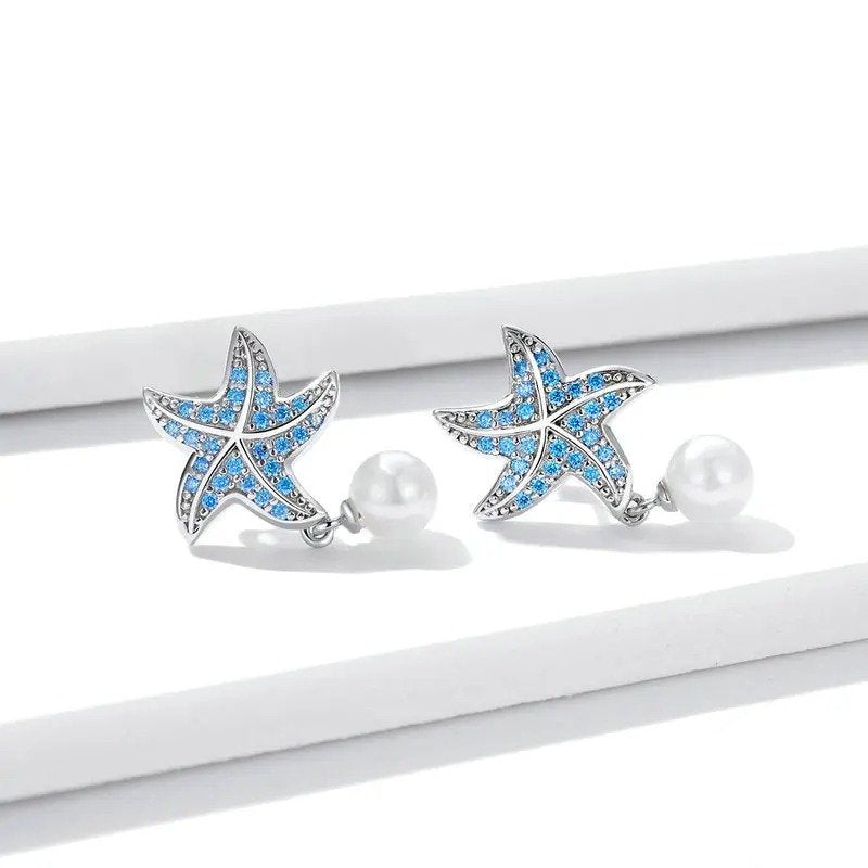 Boucles d'oreilles à tige en forme d'étoile de mer en zircon bleu océan Boucles d'oreilles pendantes en perles de coquillage