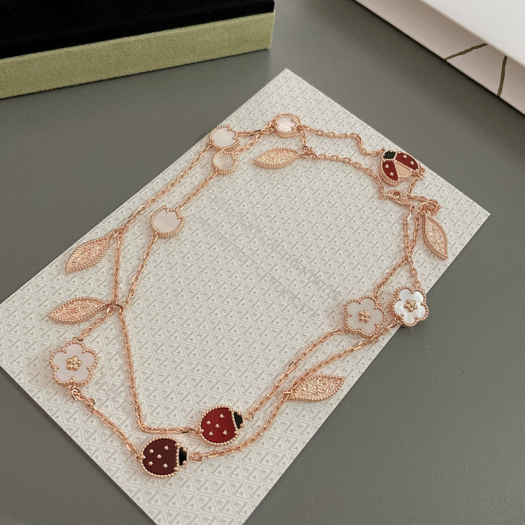 [Joyas Regalia] COLLAR DE ORO ROSA CON 15 MOTIVOS LUCKY SPRING