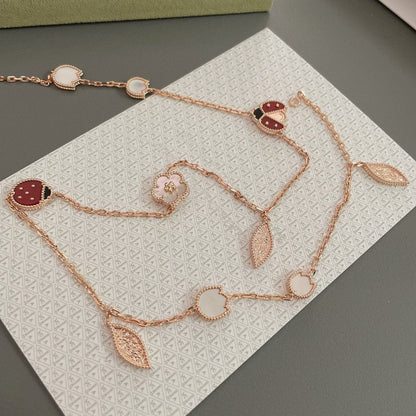 [Joyas Regalia] COLLAR DE ORO ROSA CON 15 MOTIVOS LUCKY SPRING