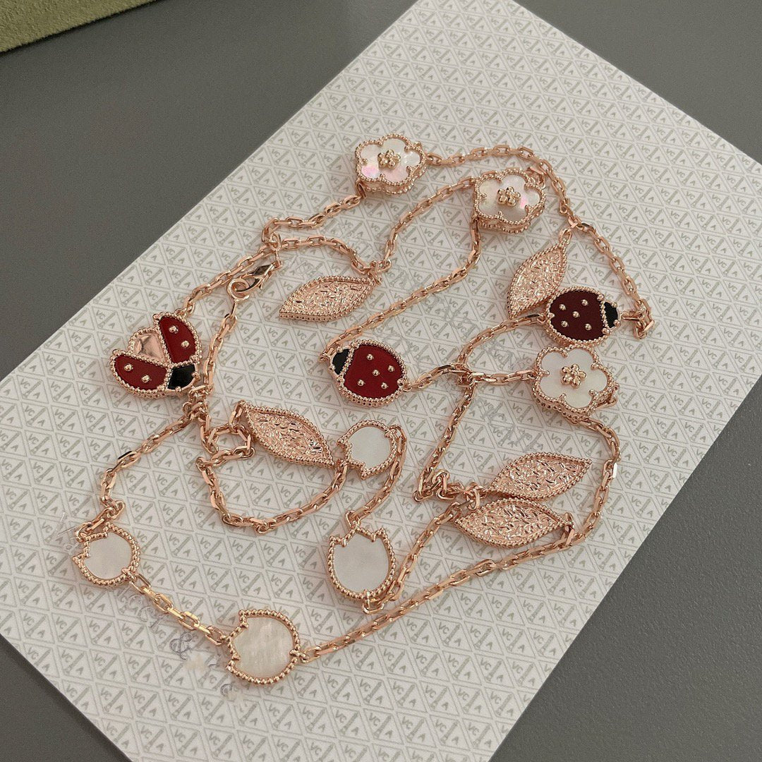 [Joyas Regalia] COLLAR DE ORO ROSA CON 15 MOTIVOS LUCKY SPRING