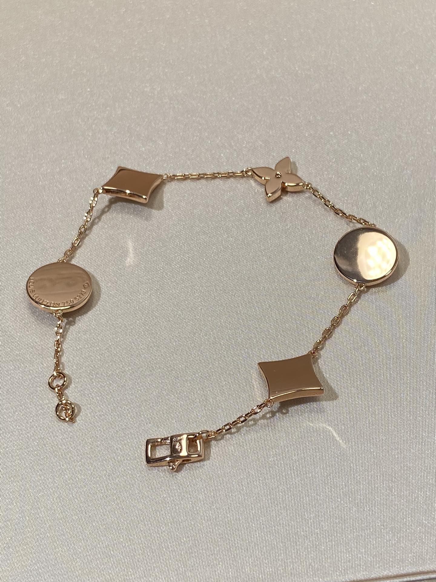[Regalia jewelry]STAR AND SUN 5 MOTIF MOP PINK GOLD BRACELET