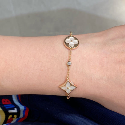 [Joyas Regalia] PULSERA DE ORO ROSA CON 4 MOTIVOS DE ESTRELLA Y SOL EN BLANCO 
