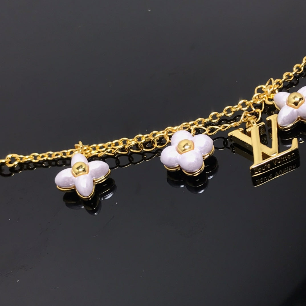 [Regalia jewelry]LOGO 6 MOTIF STAR AND SUN GOLD BRACELET