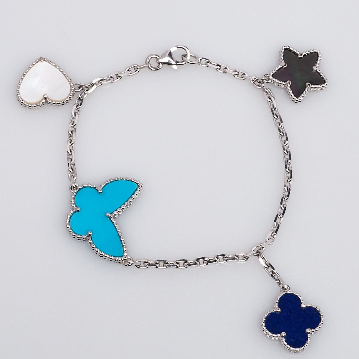 [Joyas Regalia]PULSERA DE PLATA LUCKY SPRING CON 4 MOTIVOS