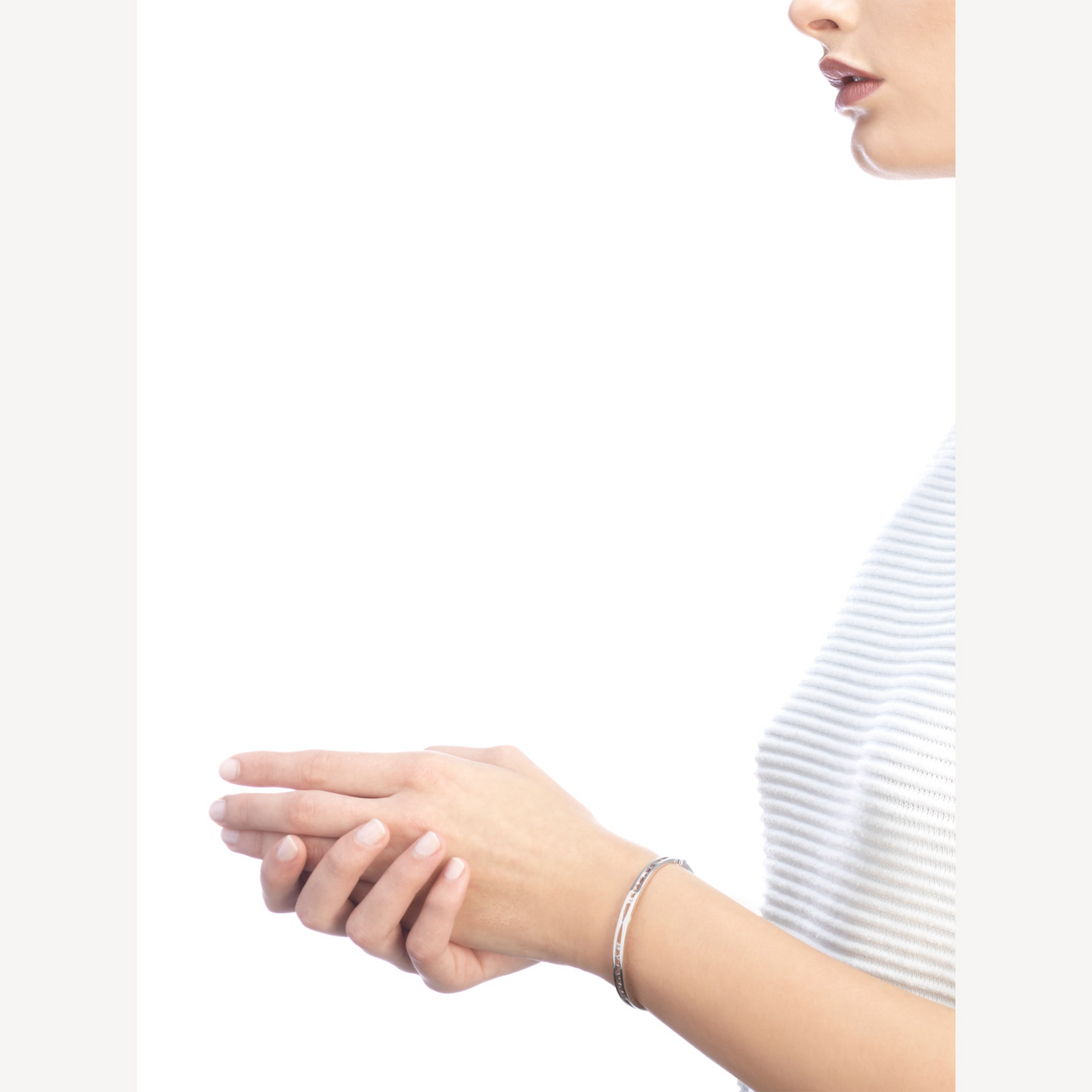 [Joyas Regalia] PULSERA DE PLATA CON LOGO EN ESPIRAL ZERO 1