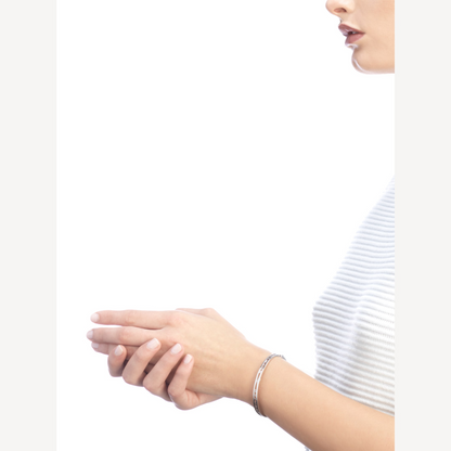 [Joyas Regalia] PULSERA DE PLATA CON LOGO EN ESPIRAL ZERO 1