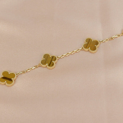 [Joyas Regalia] PULSERA DE OJO DE TIGRE CON 5 MOTIVOS DE TRÉBOL 