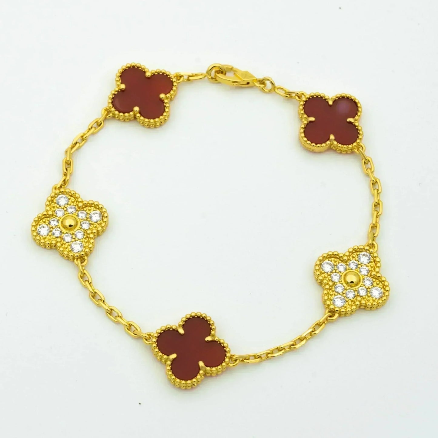 [Joyas Regalia] PULSERA DE DIAMANTES Y CORNALINA CON 5 MOTIVOS DE TRÉBOL