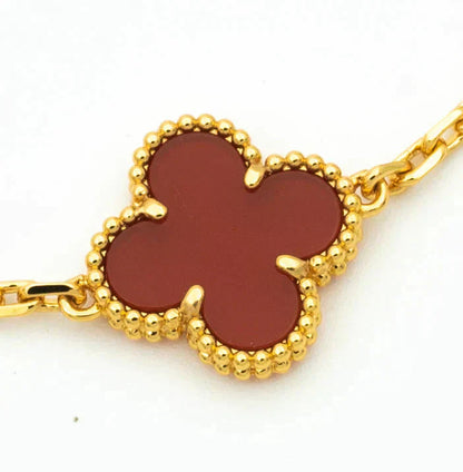 [Joyas Regalia] PULSERA DE DIAMANTES Y CORNALINA CON 5 MOTIVOS DE TRÉBOL