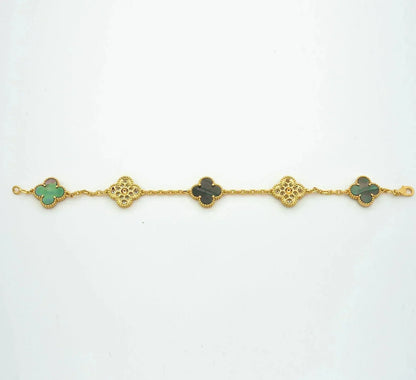 [Joyas Regalia] PULSERA DE DIAMANTES CON 5 MOTIVOS DE TRÉBOL EN COLOR GRIS