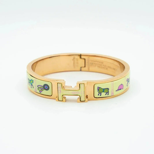 [Joyas Regalia] PULSERA H ORO ROSA CERÁMICA CREMA