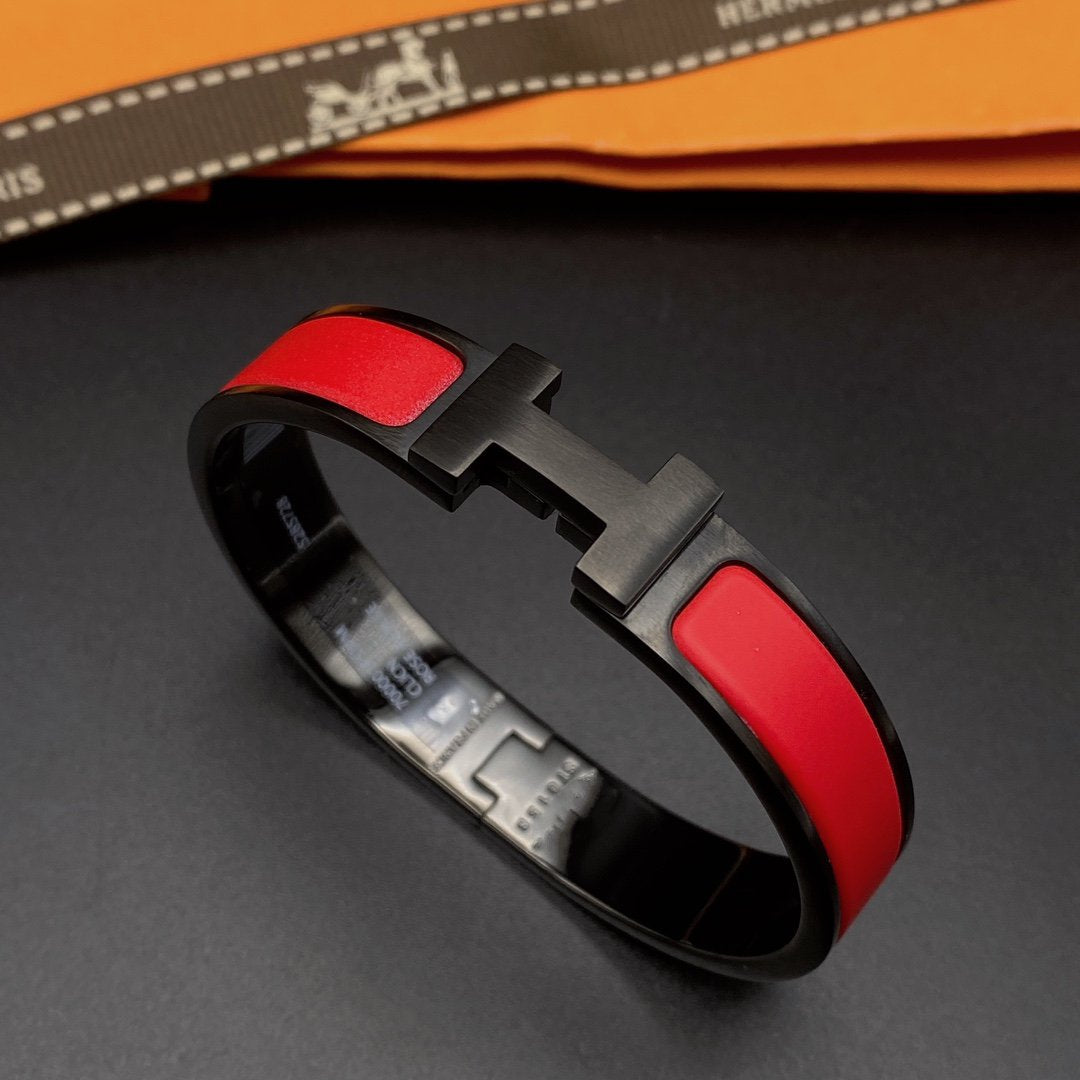 [Joyas Regalia] PULSERA CLIC HM SO NEGRA Y ROJA
