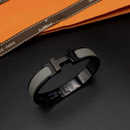 [Joyas Regalia] PULSERA CLIC HM SO NEGRO GRIS