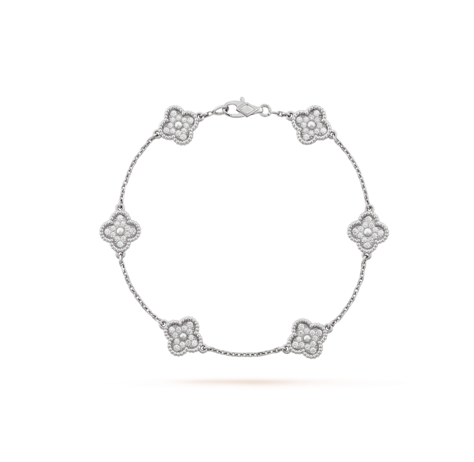 [Joyas Regalia] PULSERA DE PLATA CON DIAMANTES Y 6 MOTIVOS DE TRÉBOL