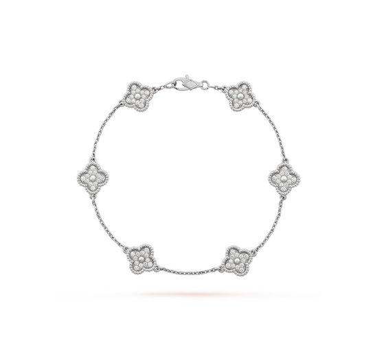 [Joyas Regalia] PULSERA DE PLATA CON DIAMANTES Y 6 MOTIVOS DE TRÉBOL
