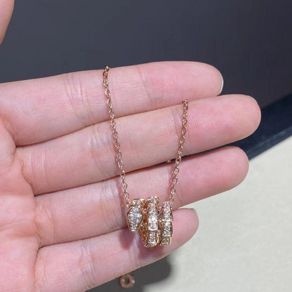 [Joyas Regalia]COLLAR SERPENTI DE ORO ROSA CON DOBLE ANILLO Y DIAMANTE