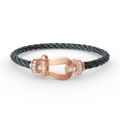 [Joyas Regalia] PULSERA FORCE DE MEDIO DIAMANTE CON HERRADURA GRANDE EN ORO ROSA