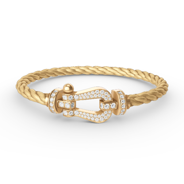 [Joyas Regalia]Pulsera de herradura grande con diamantes en oro.