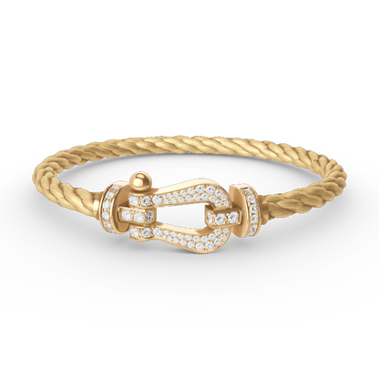 [Joyas Regalia]Pulsera de herradura grande con diamantes en oro.