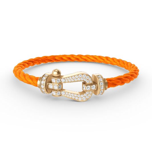 [Joyas Regalia]Pulsera de herradura grande con diamantes en oro.
