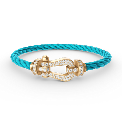 [Joyas Regalia]Pulsera de herradura grande con diamantes en oro.