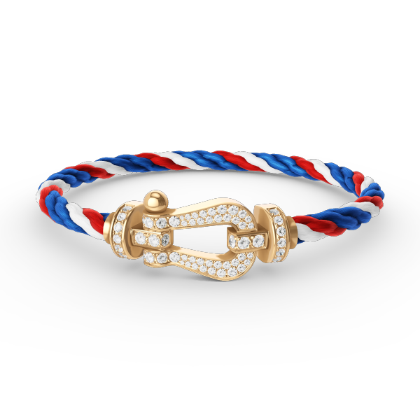 [Joyas Regalia]Pulsera de herradura grande con diamantes en oro.