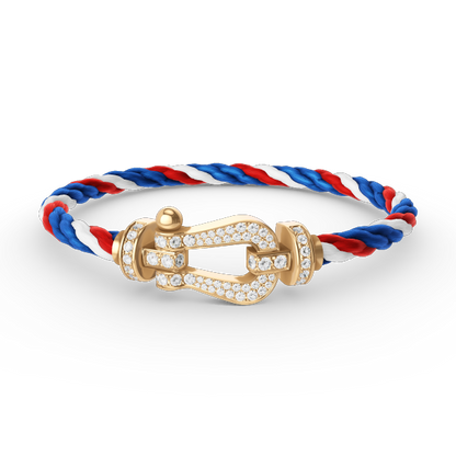 [Joyas Regalia]Pulsera de herradura grande con diamantes en oro.