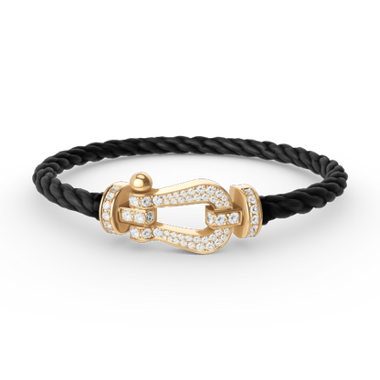 [Joyas Regalia]Pulsera de herradura grande con diamantes en oro.
