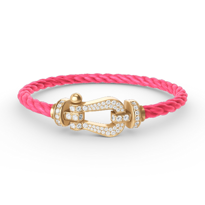 [Joyas Regalia]Pulsera de herradura grande con diamantes en oro.