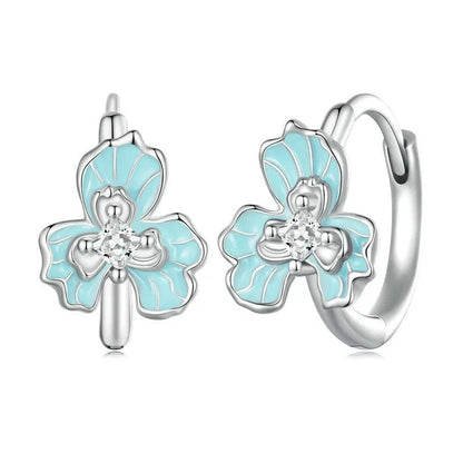 Boucles d'oreilles créoles en émail bleu avec fleur d'iris
