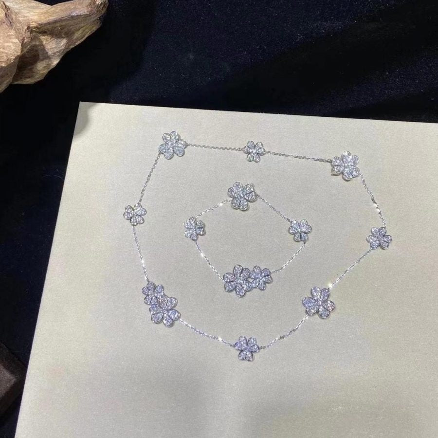 [Joyas Regalia]PULSERA FRIVOLE DE PLATA CON 5 FLORES