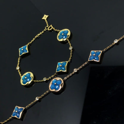 [Joyas Regalia]PULSE AZUL CON 4 MOTIVOS DE ESTRELLA Y SOL
