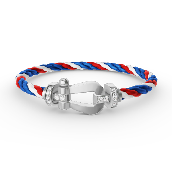 [Joyas Regalia]Pulsera de herradura grande con medio diamante en plata.
