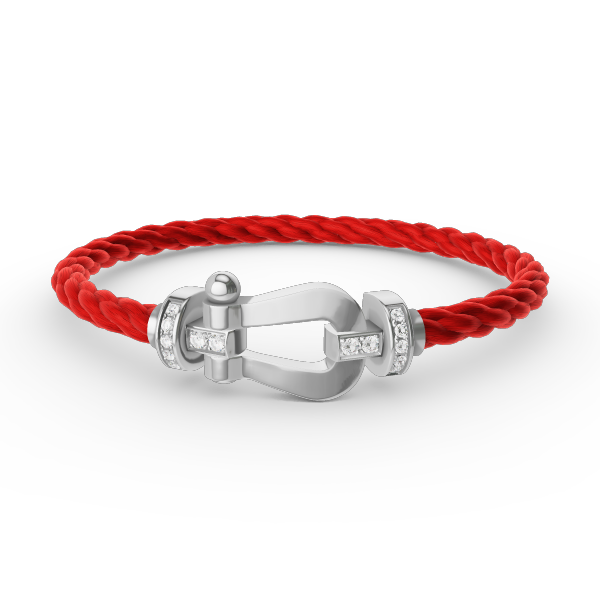 [Joyas Regalia]Pulsera de herradura grande con medio diamante en plata.