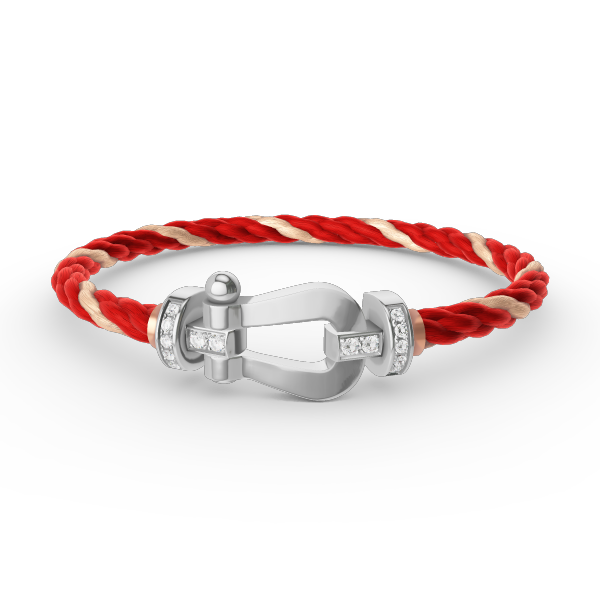 [Joyas Regalia]Pulsera de herradura grande con medio diamante en plata.